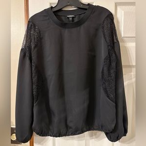 Cute black women’s top from Express size medium with lace cutout details